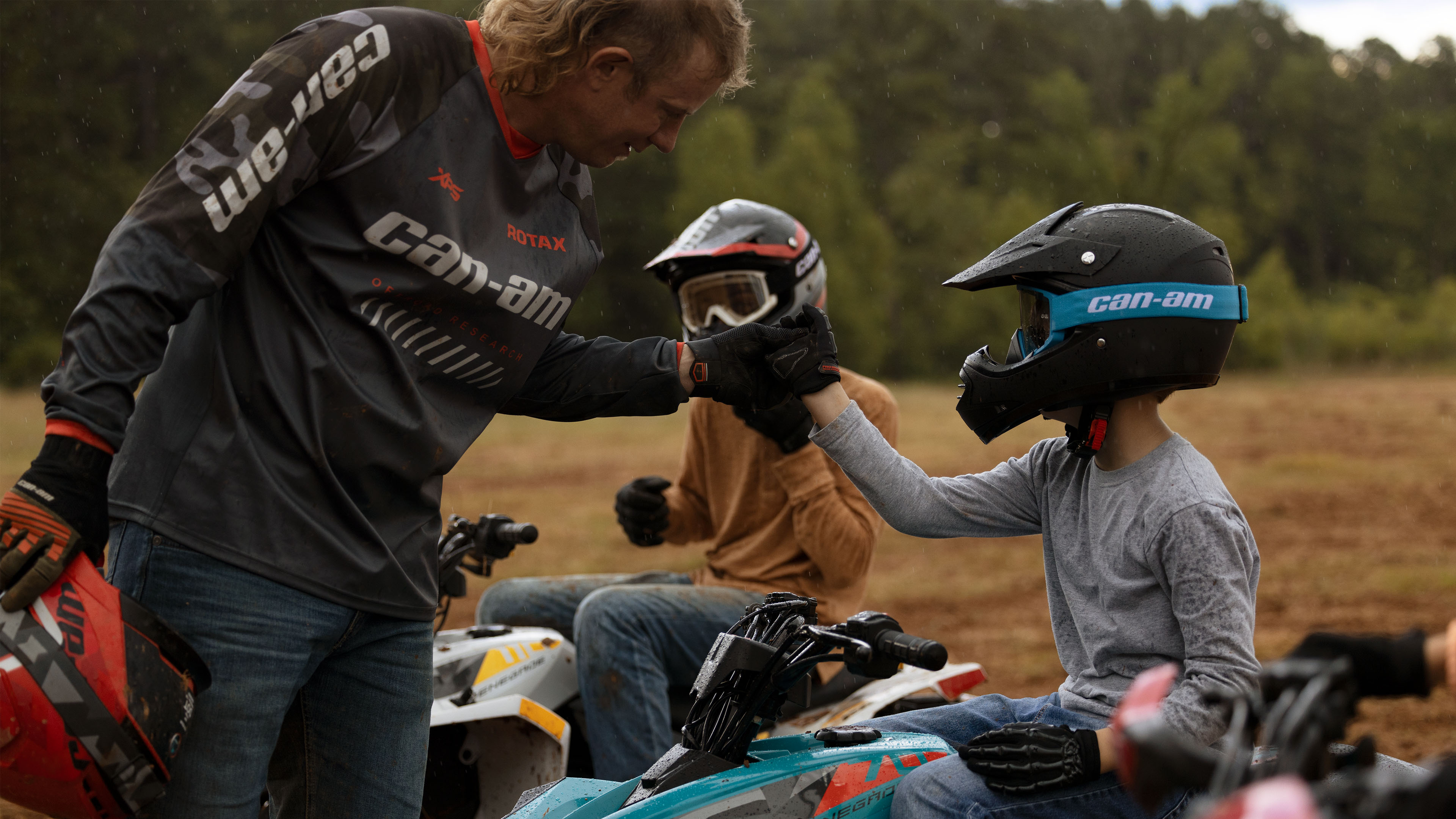Fist bump for young ATV riders