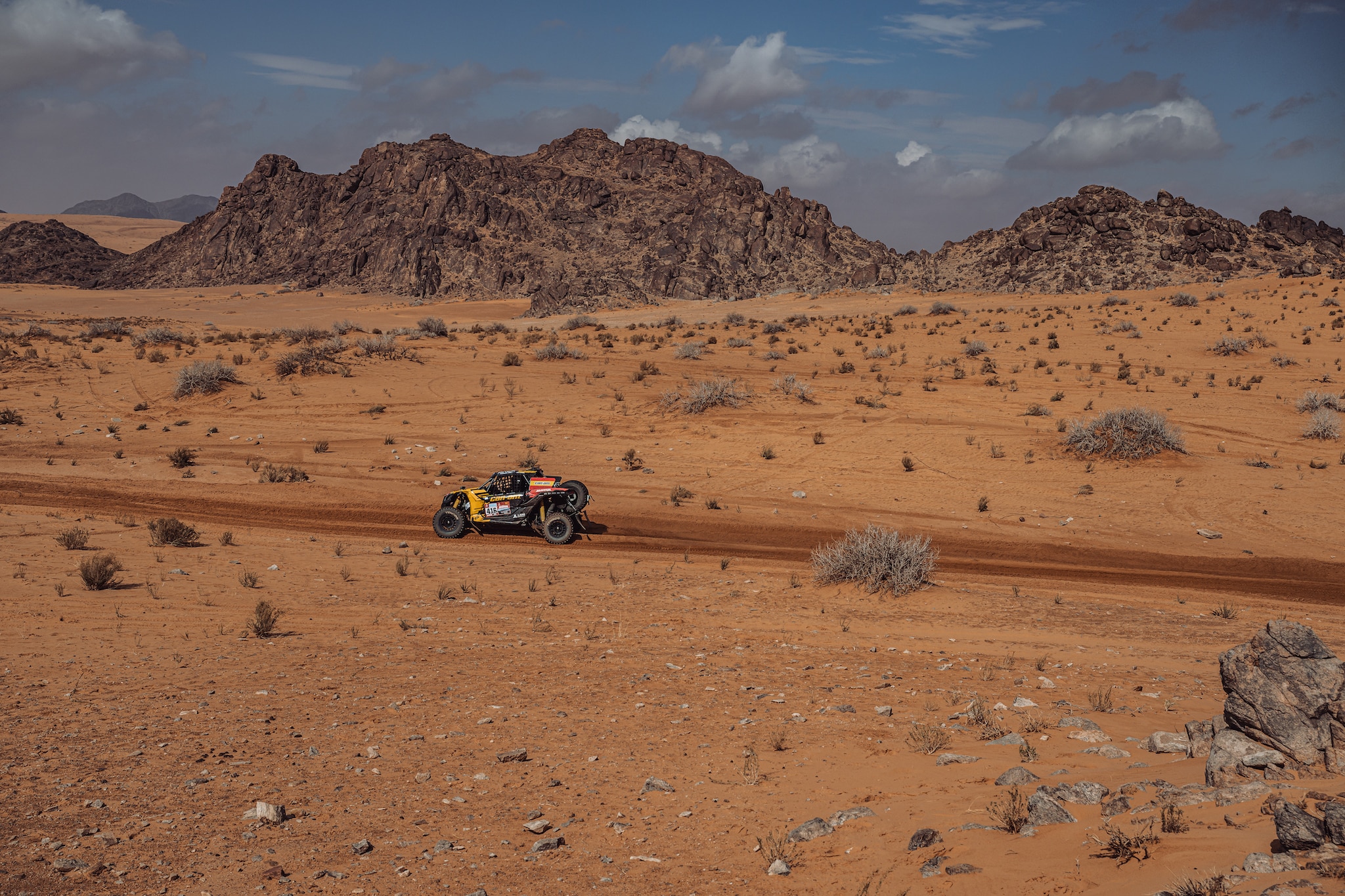 Maverick X3 speeding through the desert