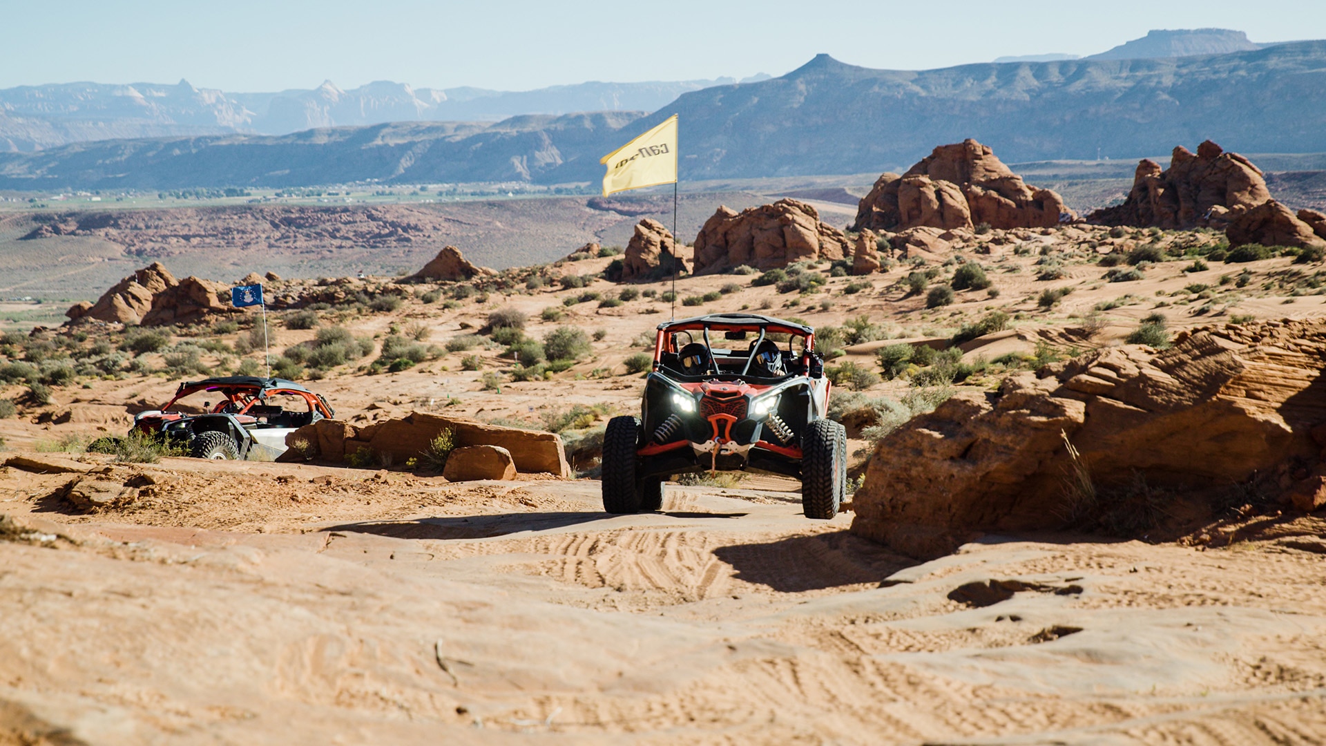 Can-Am SxS vehicle riding in the desert