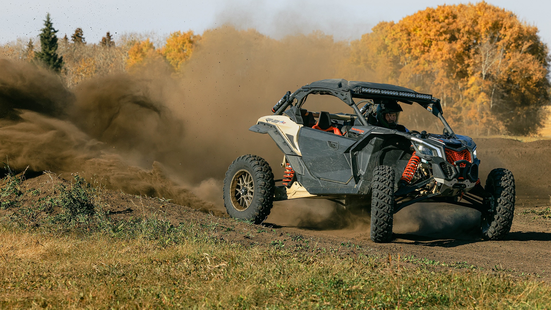 Can-Am Maverick RS Turbo SxS burning rubber on a dirt road