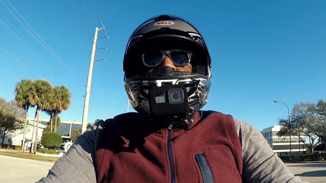 Man riding his Ryker with his Helmet, glasses and camera on