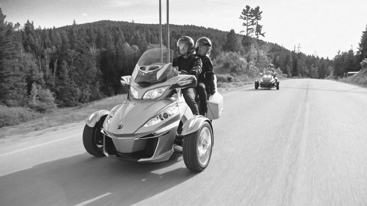 A men and a women on a Can-Am Spyder
