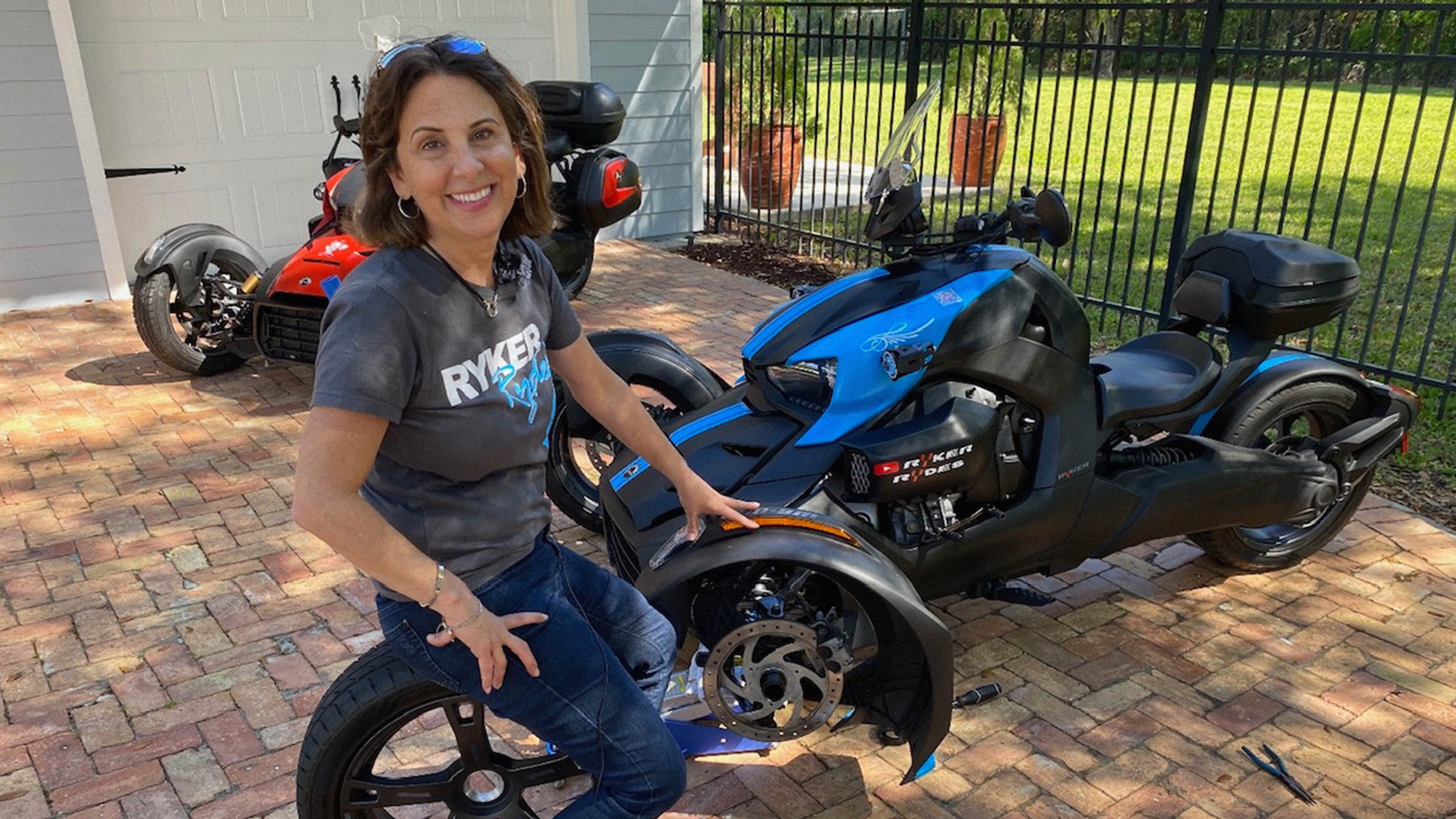 Andrea posing on her Can-Am Spyder F3