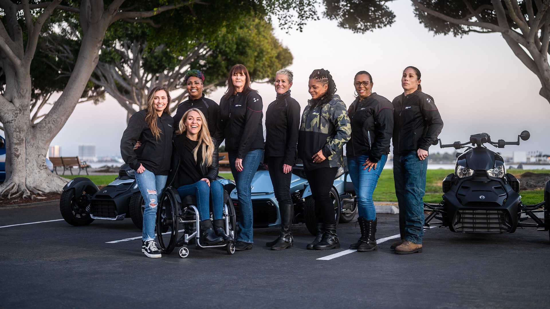 Group of Women Posing With Can-Am 3-Wheels Products