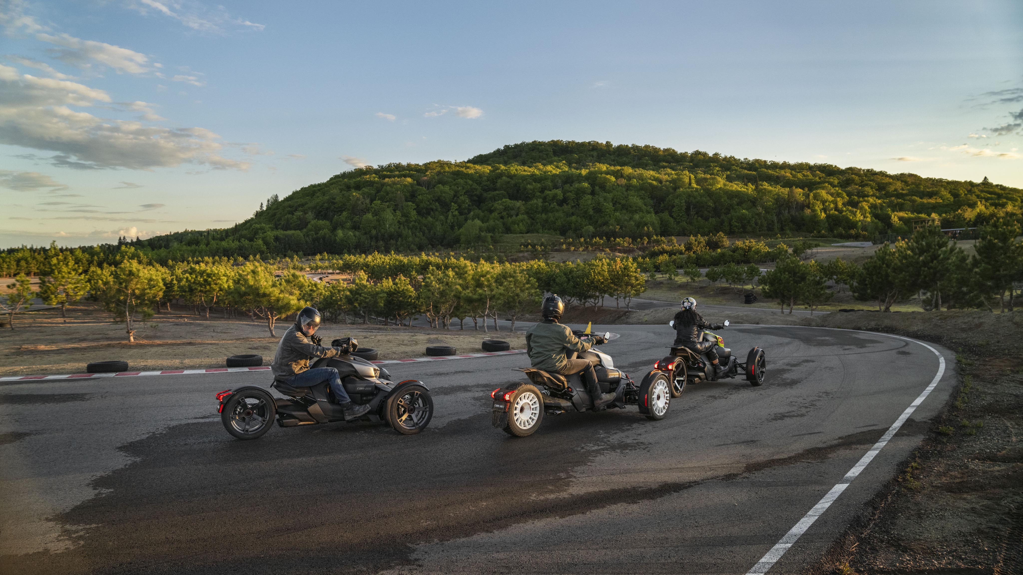 Three Can-Am riders on a race course