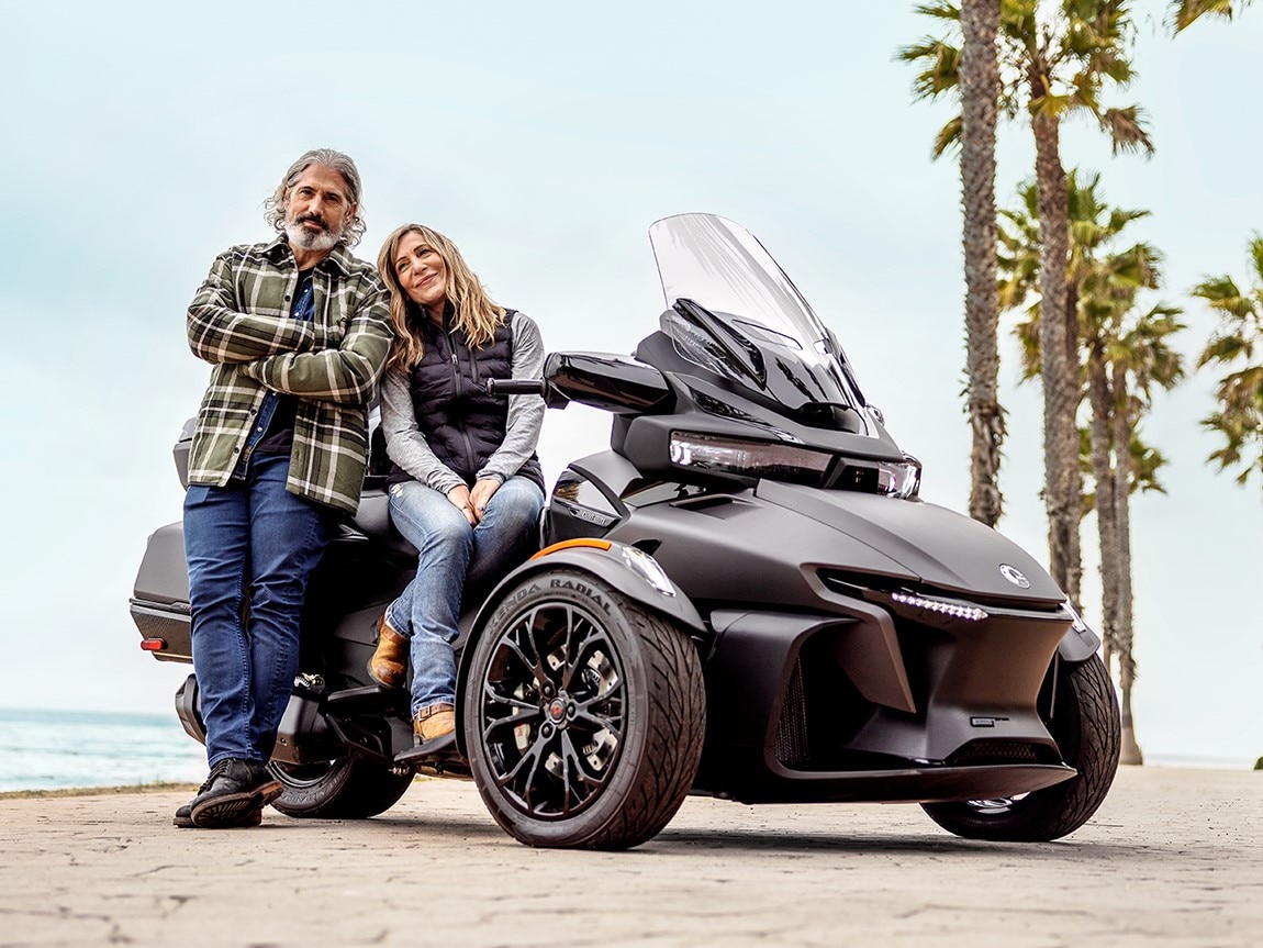 Couple sitting on a Can-Am Spyder RT