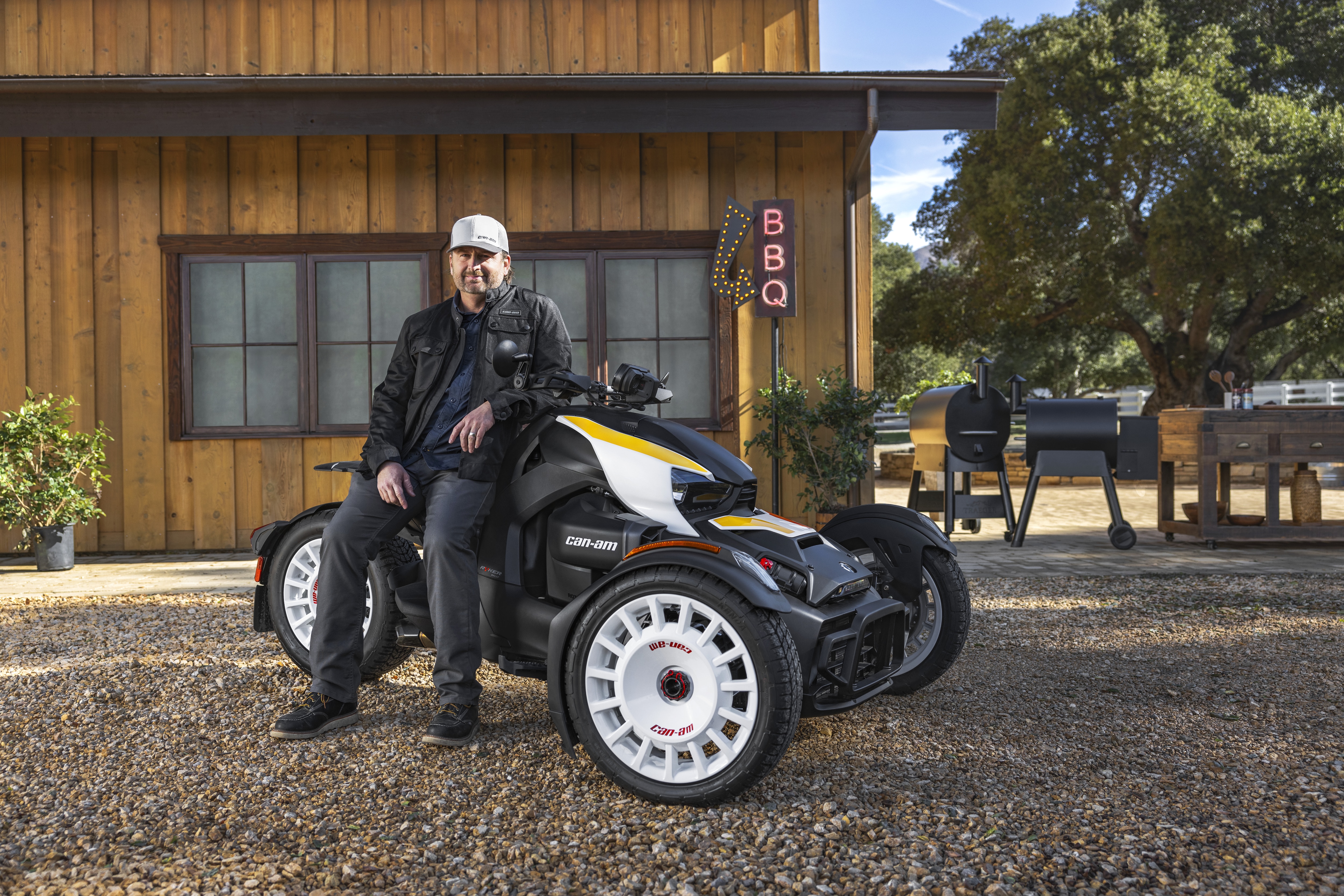 Man posing on a Can-Am Ryker Rally 3-wheel motorcycle