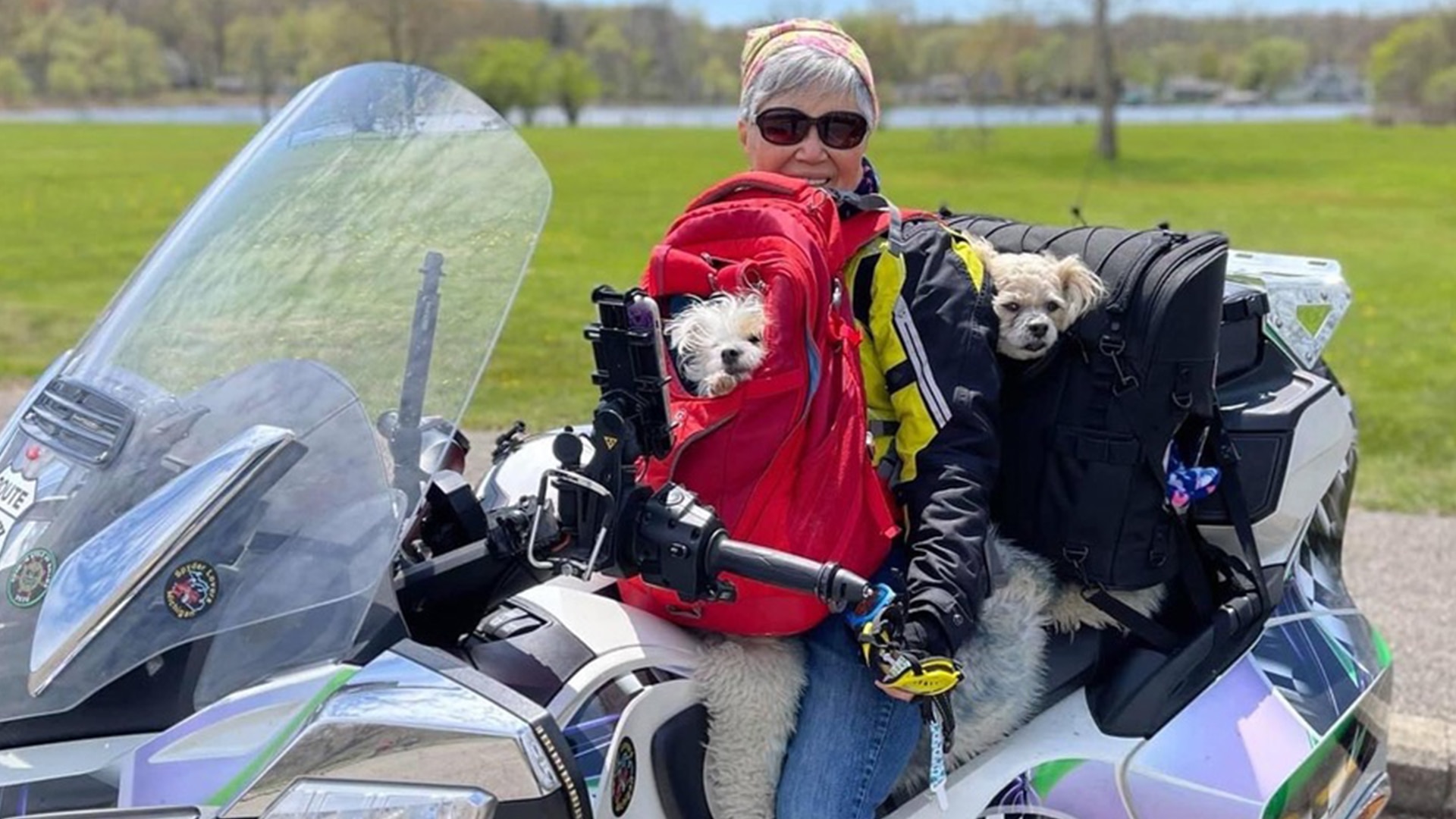 On-Road ambassador Mihee Olsen sitting her Can-Am Spyder RT with her dogs