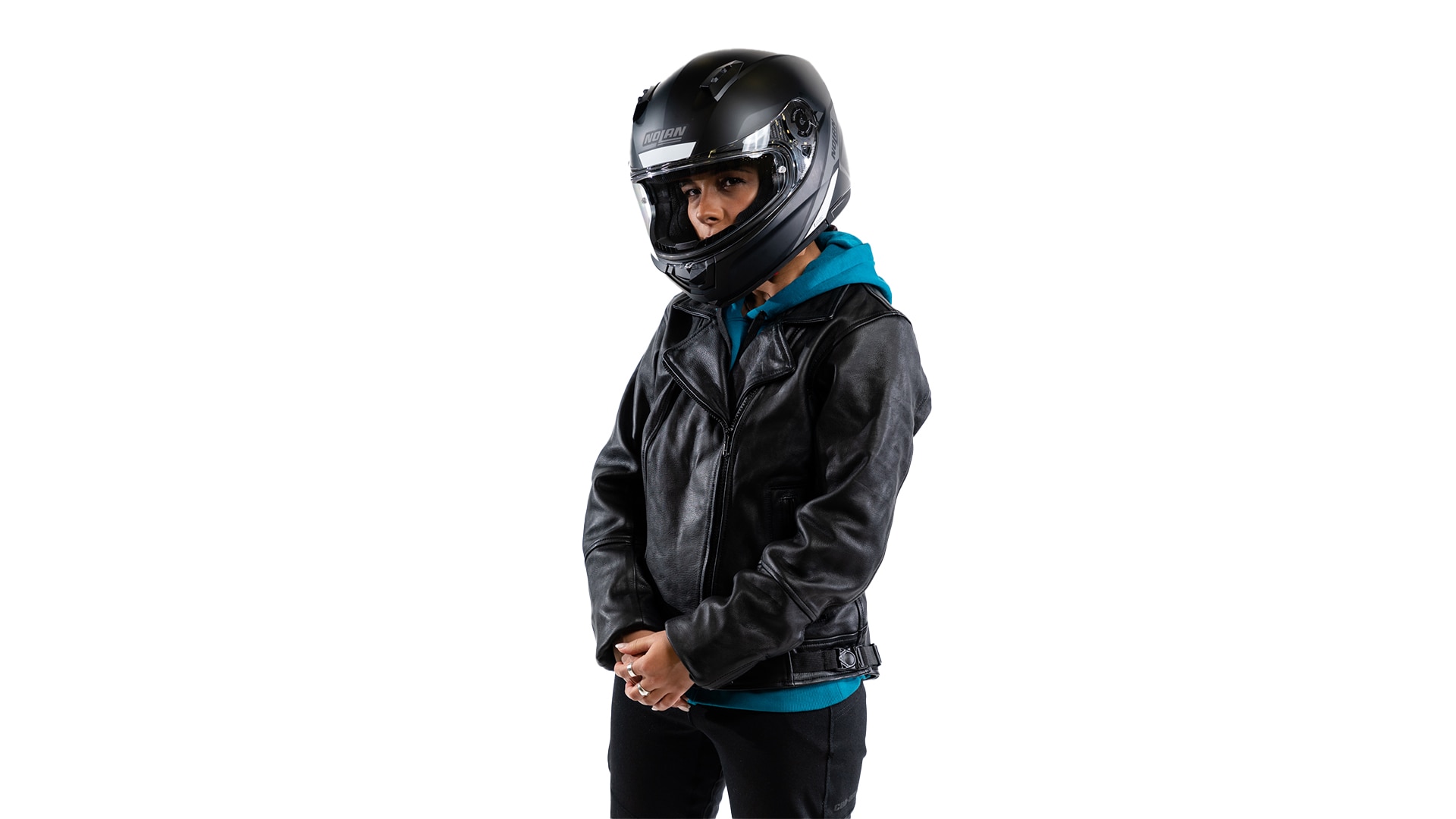 Woman wearing a Nolan helmet nd leather jacket