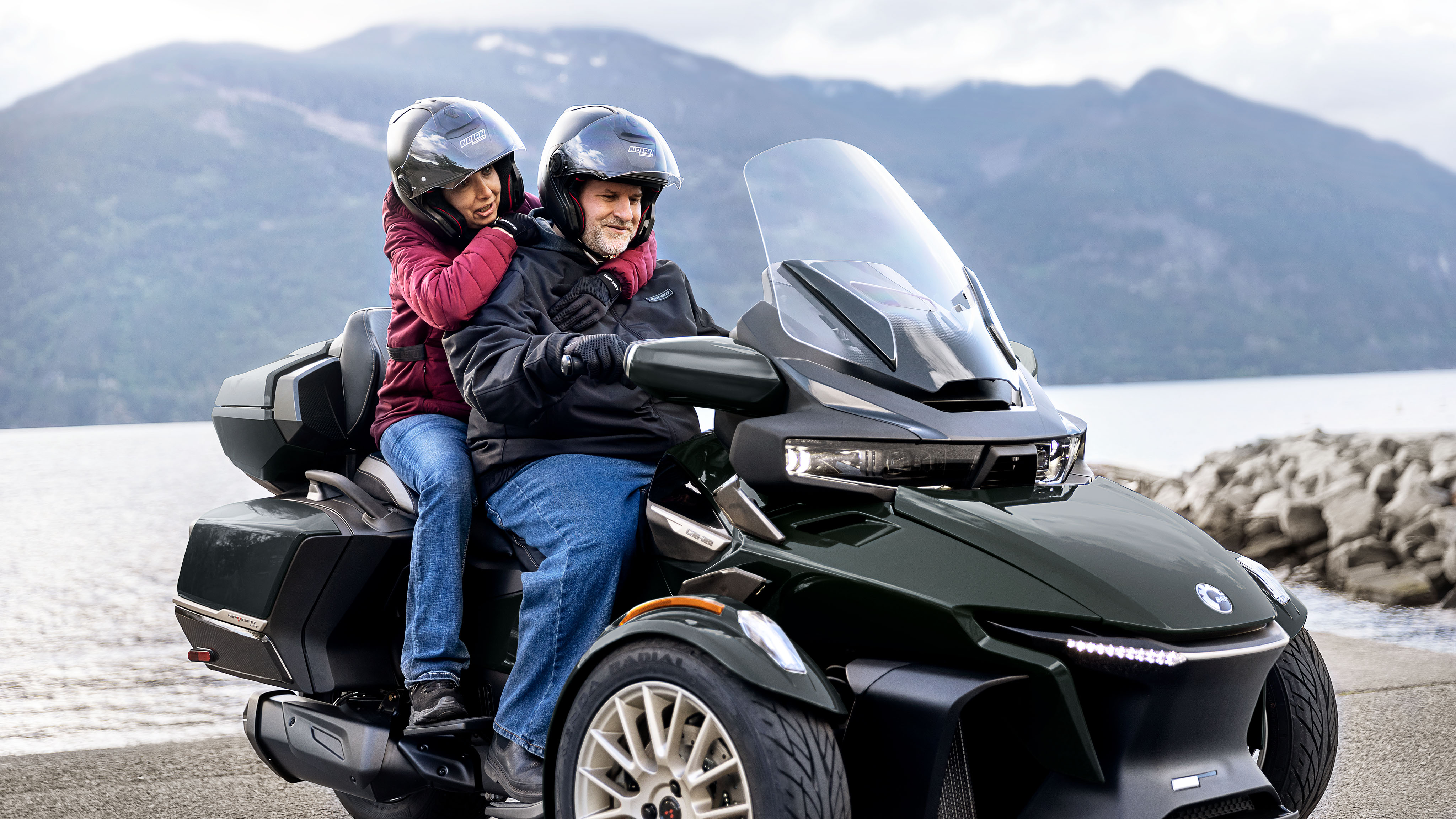 Couple sitting on their Can-Am Spyder RT 2023
