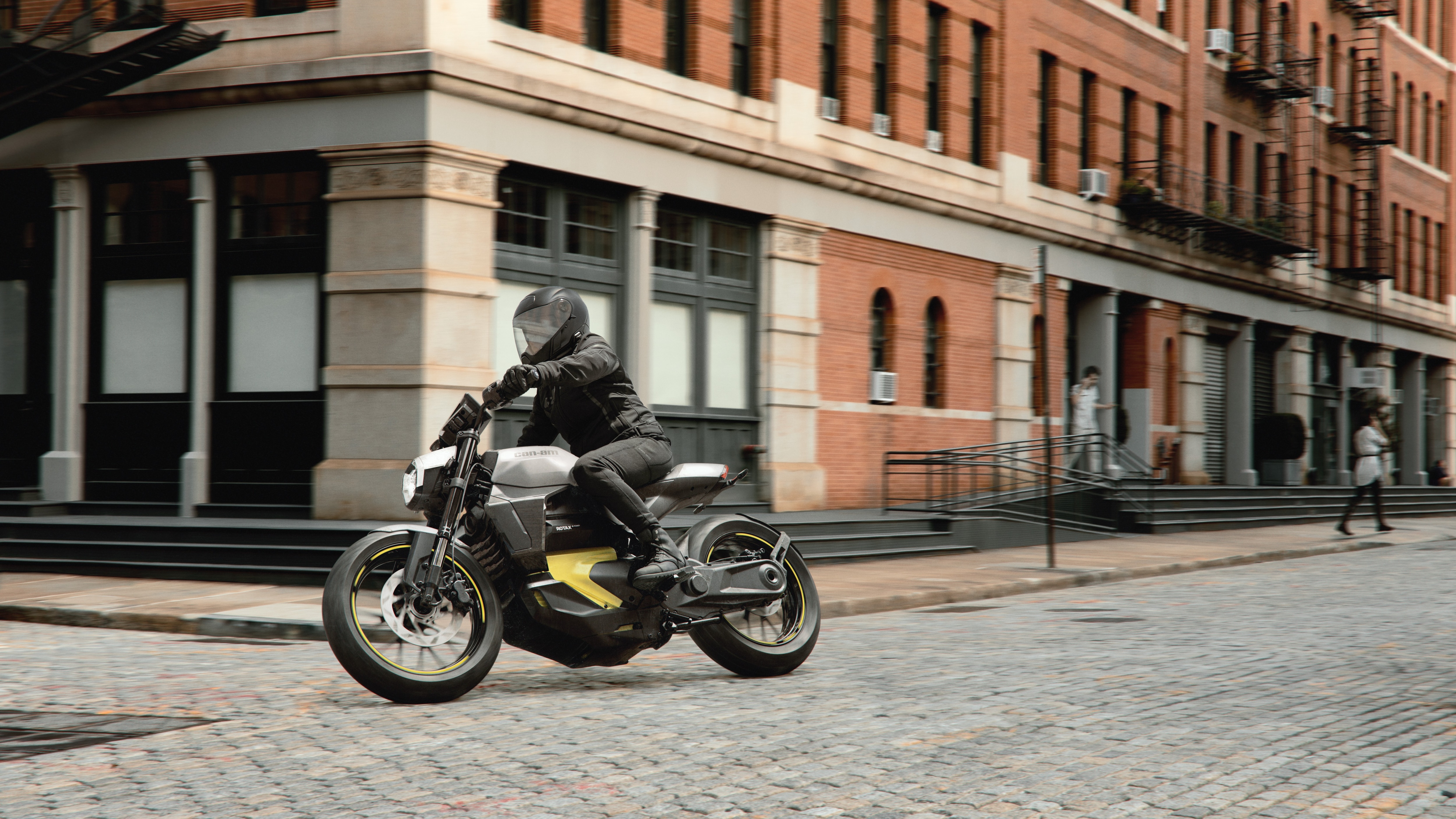 Can-Am Pulse turning in a city cobblestone road