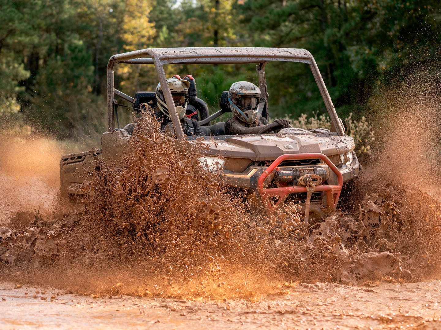 Can-Am vehicle riding in a mud hole